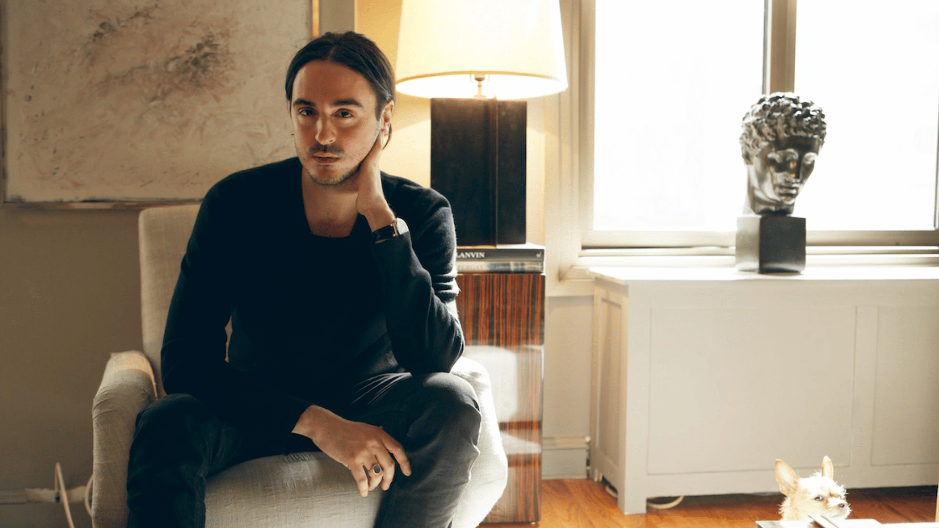 ryan korban in a sleek modern interior with bold contrast and refined urban luxury design elements