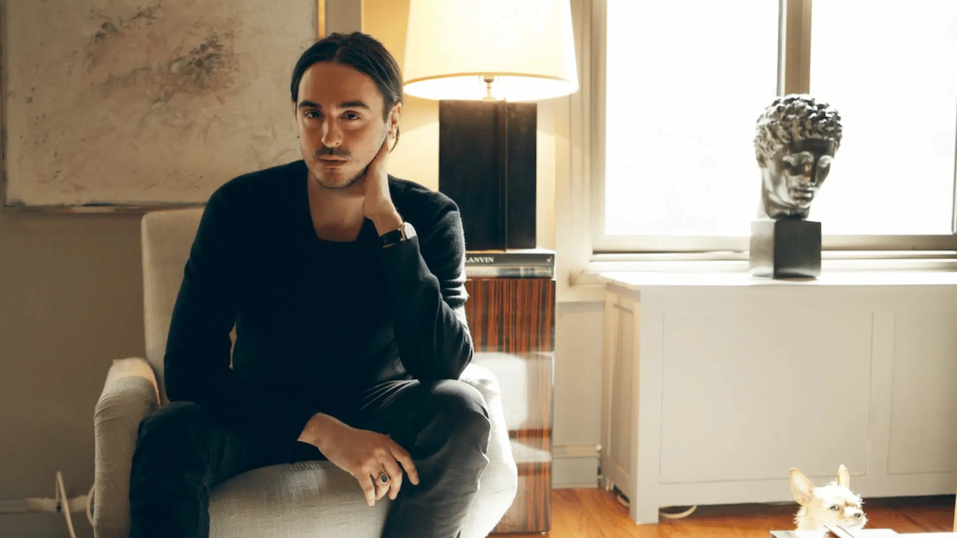 ryan korban in a sleek modern interior with bold contrast and refined urban luxury design elements