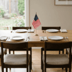 single flag at center, neutral plates, clean minimal setup, soft light