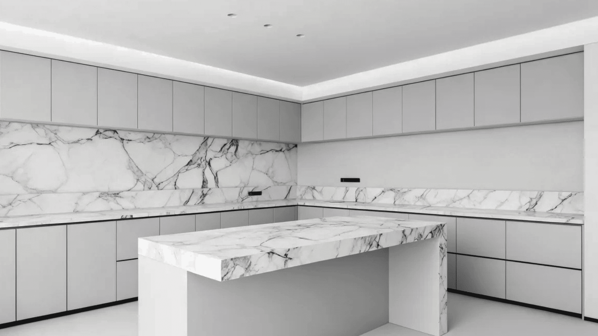 sleek white kitchen with marble countertops and large kitchen island