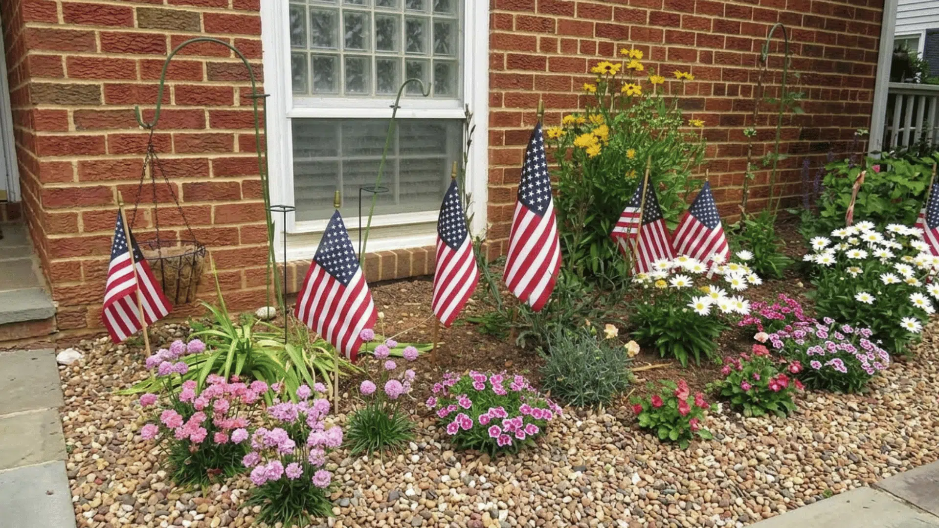 small american flags placed in lawn in neat rows creating simple and respectful display