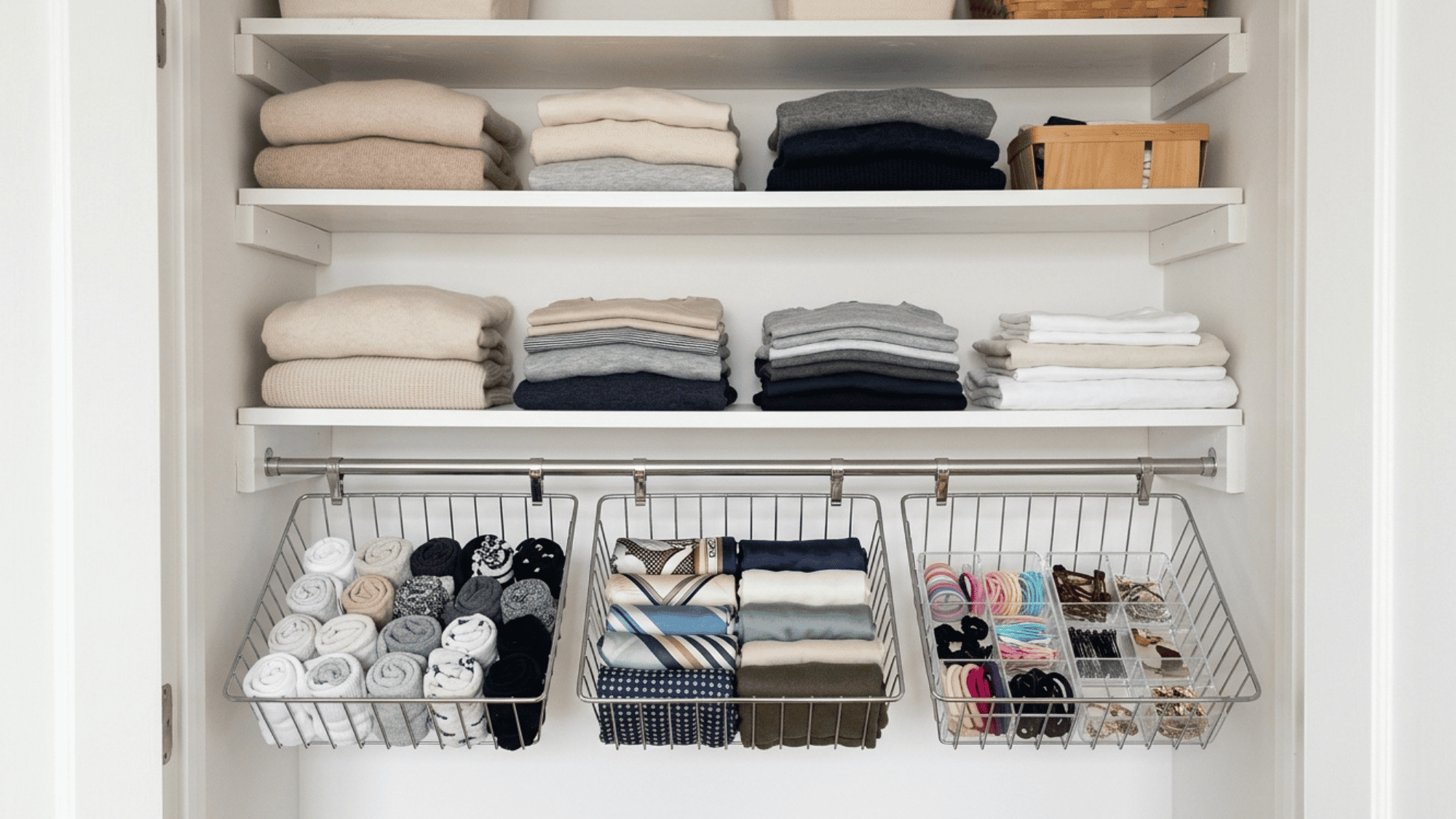 under-shelf hanging baskets as a DIY small closet idea for bonus storage.