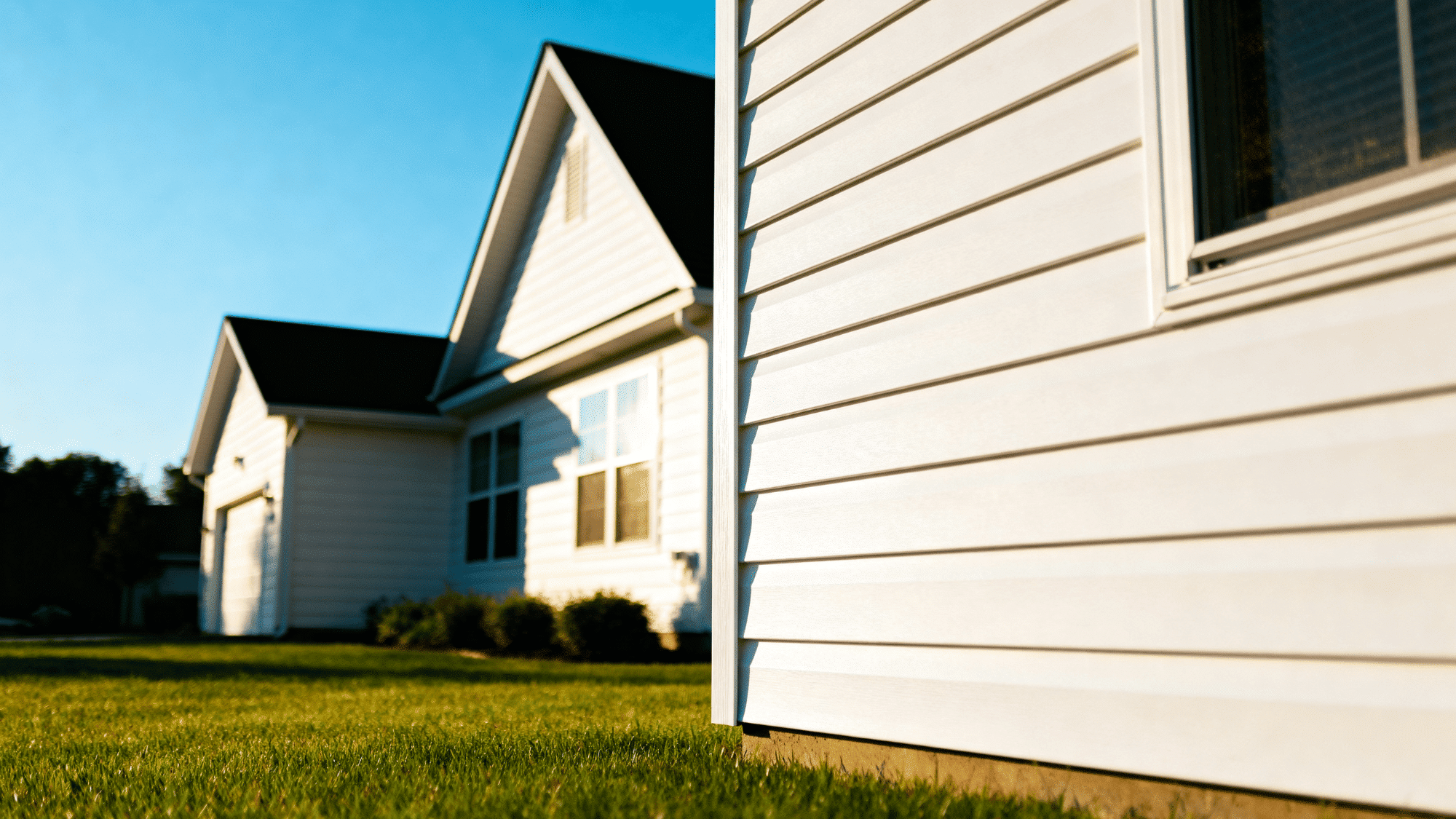 vinyl board and batten siding on modern home with clean white finish and low maintenance exterior look