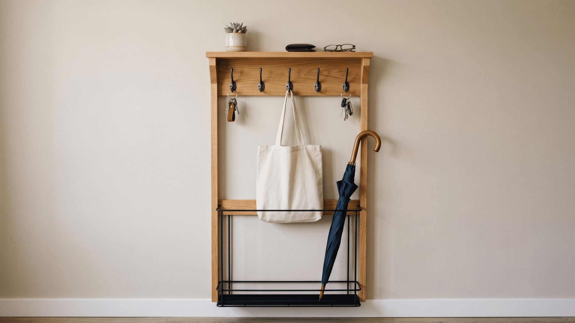wall organizer with hooks shelf and umbrella holder near entry door
