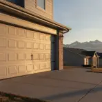 Garage door of suburban house at sunset with mountain view in the background