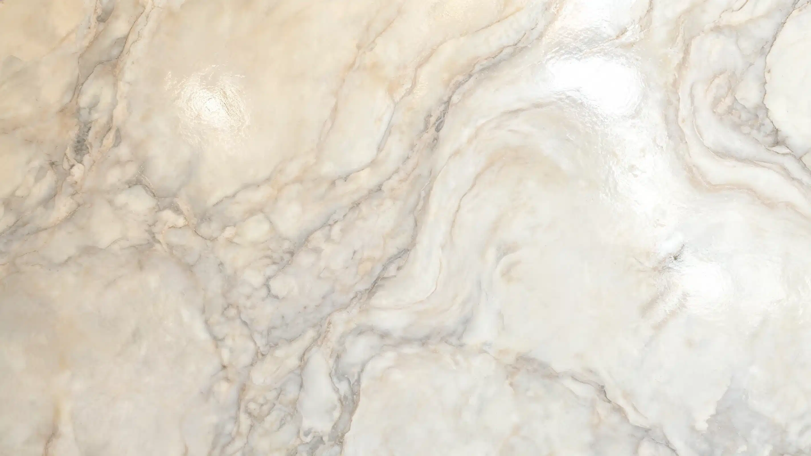 polished white and beige marble texture with soft grey veining and high gloss highlights