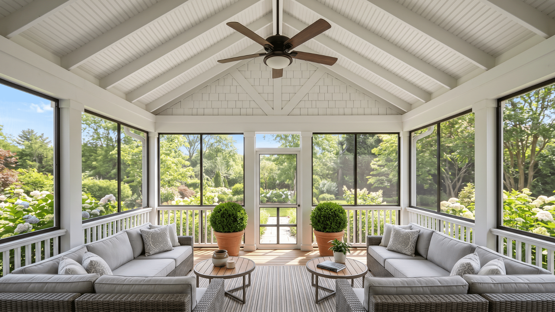 38. with a cozy furniture in a house we see a screen porch to enjoy the view of lawn