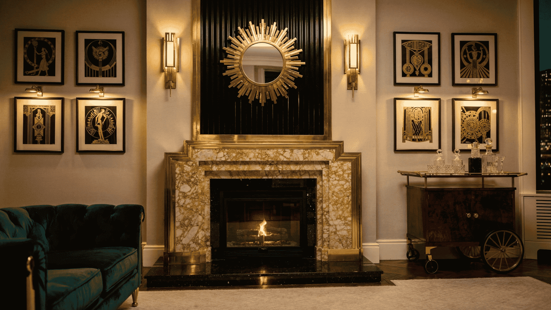 a glamorous art deco living room with a stepped marble surround framed in brass a sunburst mirror above a fluted black panel flanked by art deco framed prints and gold sconces on each side