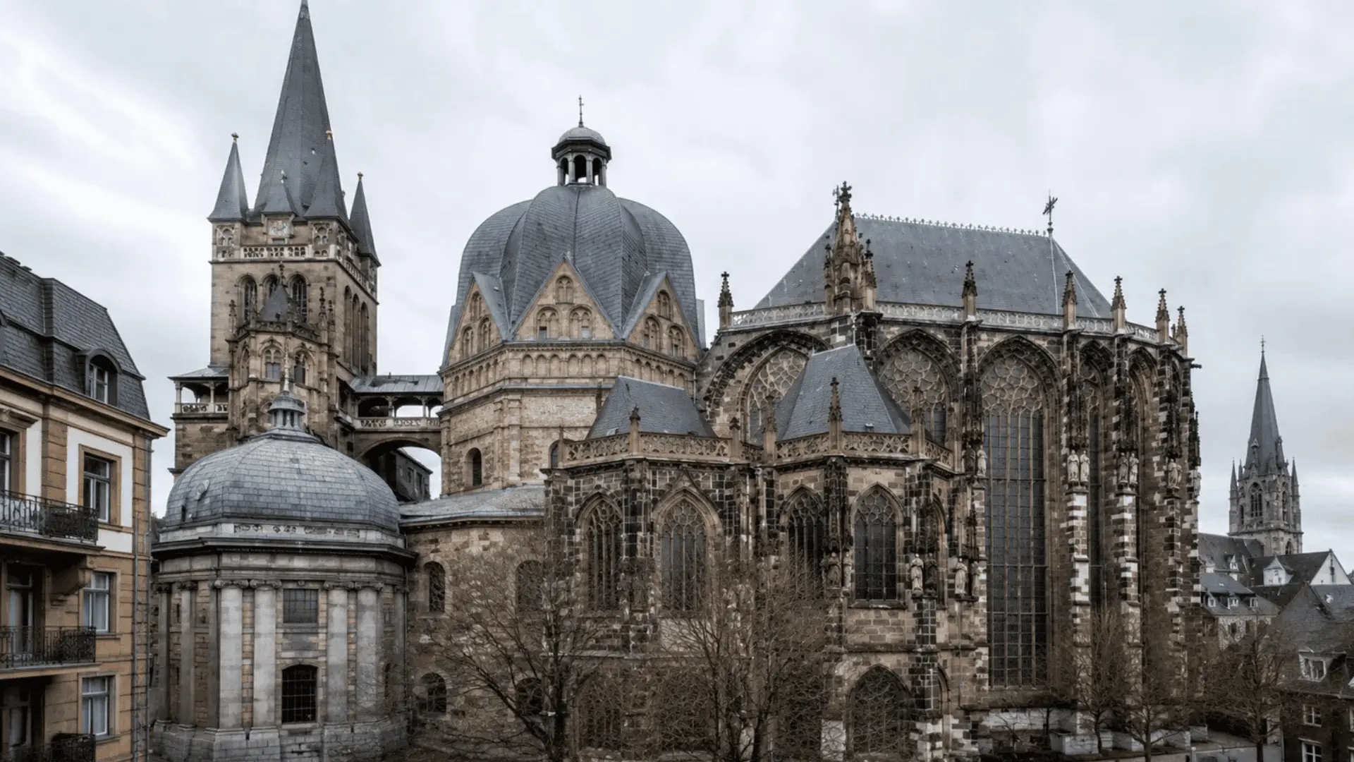aachen cathedral with its domed carolingian chapel and gothic choir hall glass tracery windows