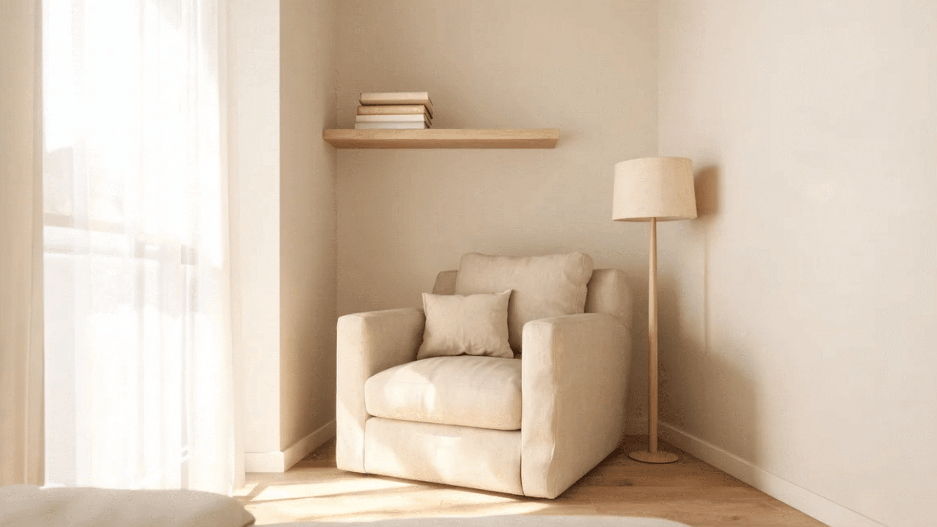 cozy corner with beige armchair floor lamp and floating shelf in sunlit room