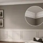 dining room with crown molding and wainscoting with a zoomed inset of the corner joint and diy tools