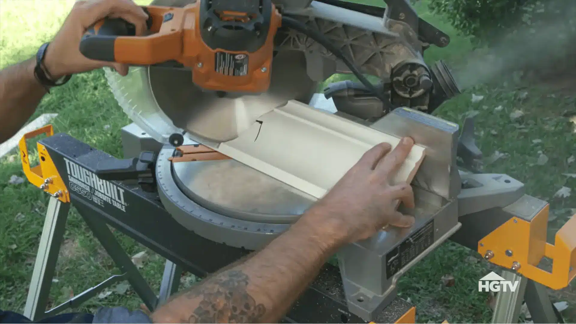 crown molding positioned upside down on a miter saw for making precise outside corner cuts at forty five degrees
