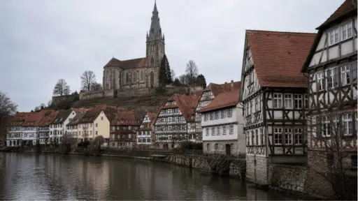 german architecture styles and house ideas header with romanesque gothic and half timbered buildings