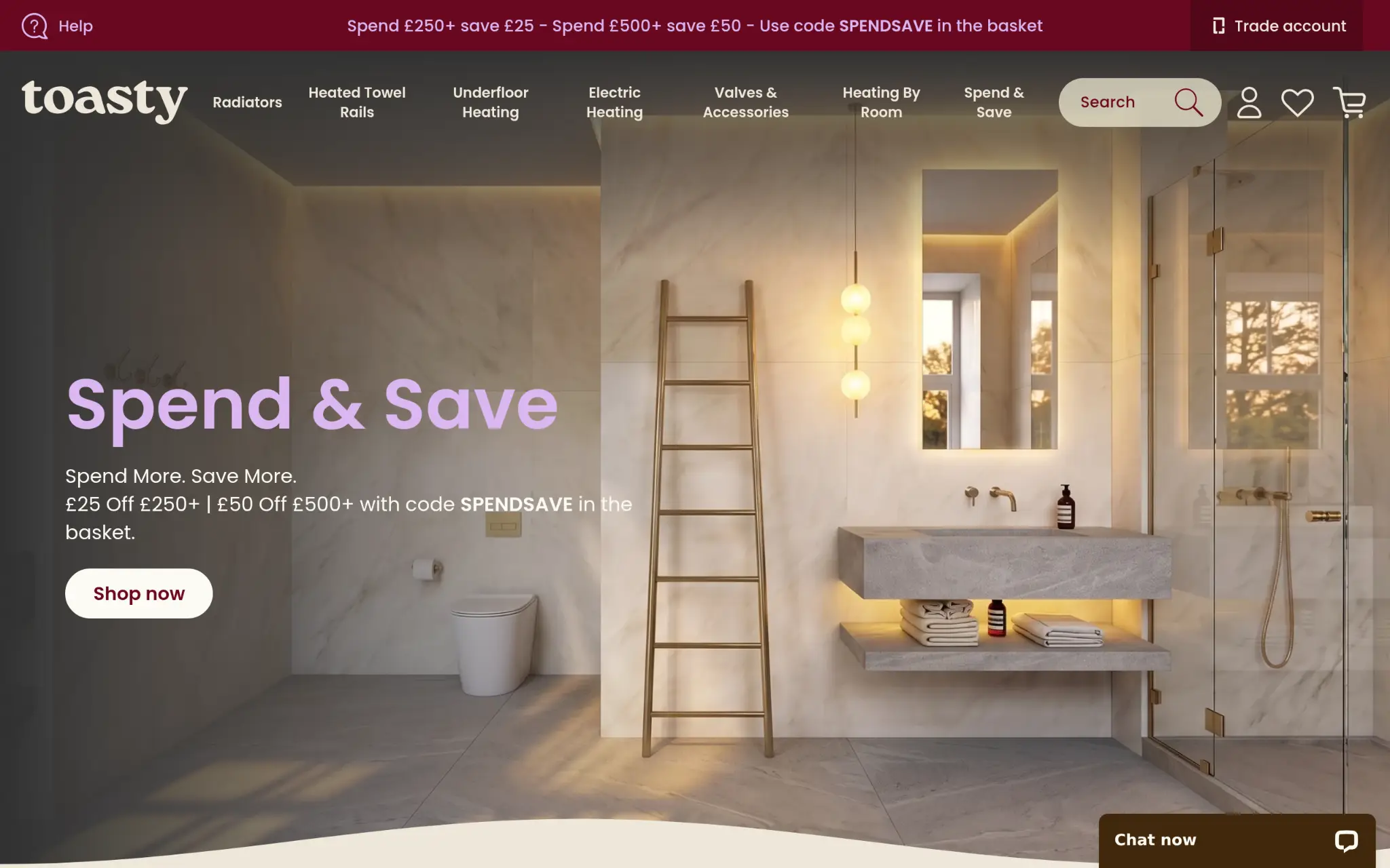 Modern bathroom with marble tiles, brass ladder, floating vanity, and warm lighting