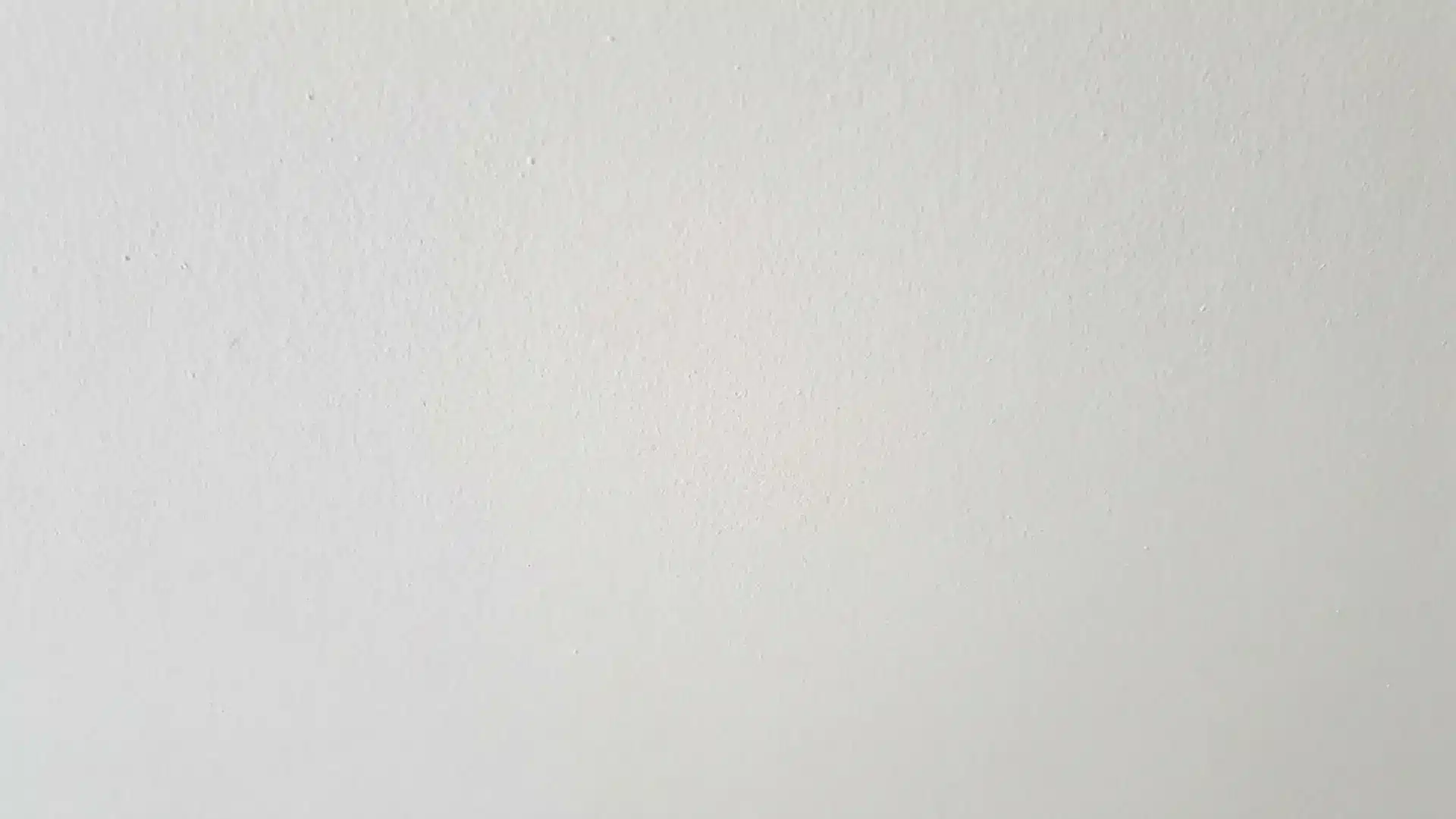 smooth flat white ceiling with flawless paint and even light reflection