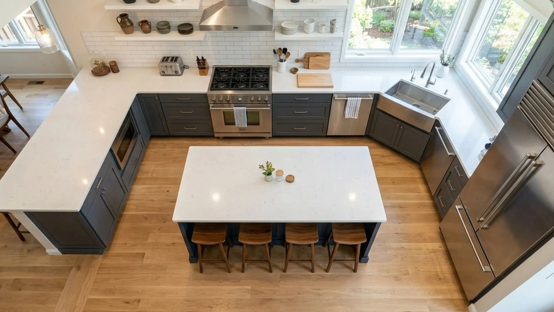 overhead view of kitchen layout showing island centered with clear walkway space visible on all four sides