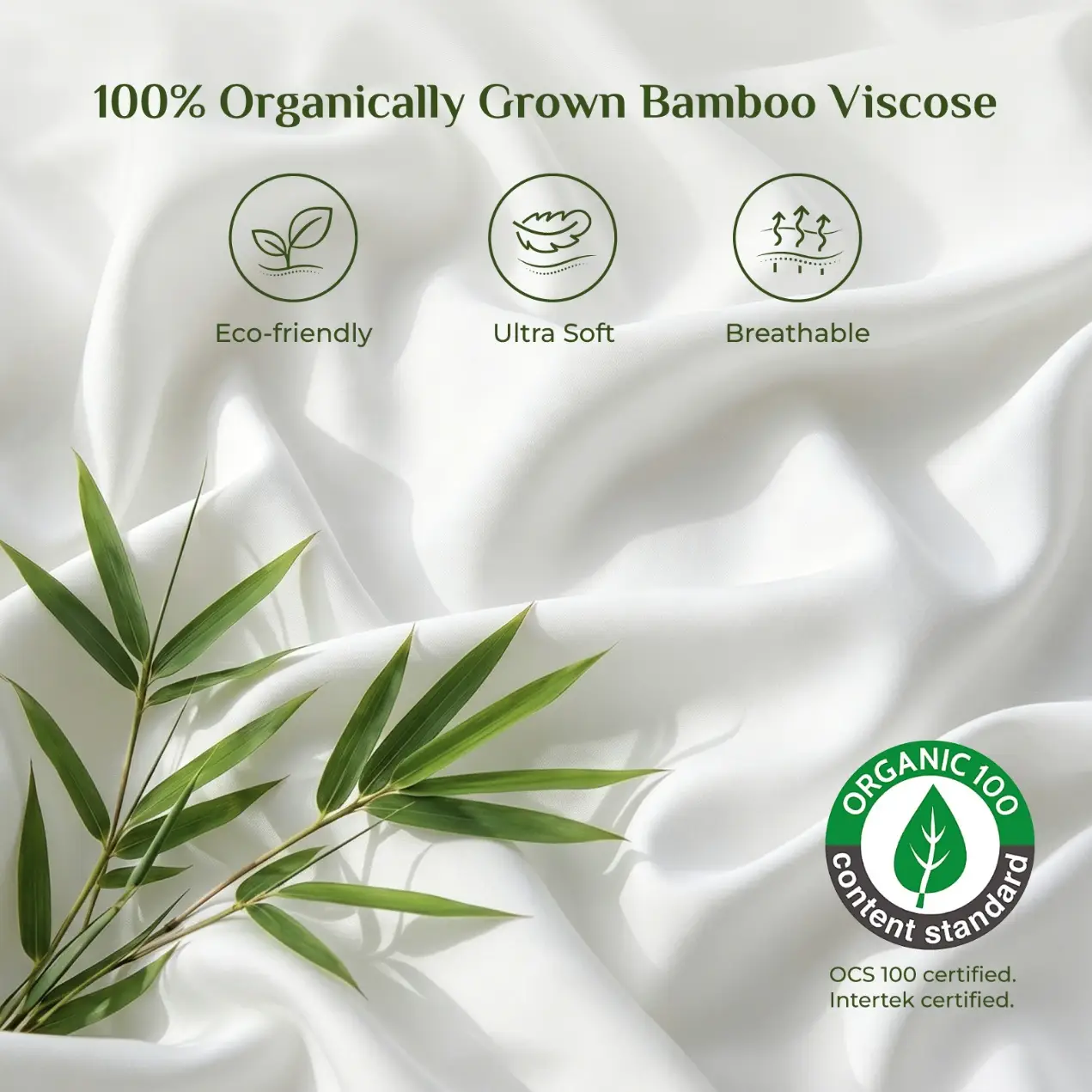 White bamboo viscose fabric with green bamboo leaves on a smooth surface