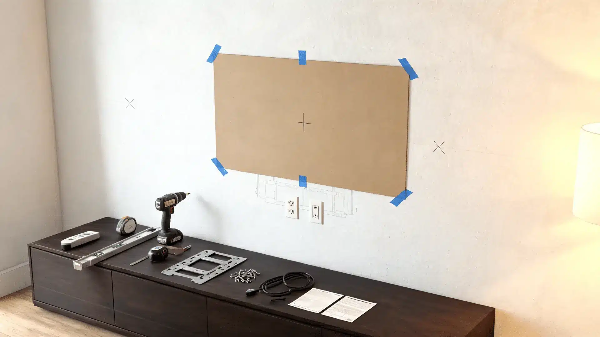 cardboard television template above mounting tools and hardware