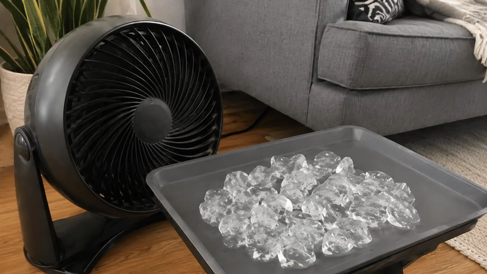 small fan blowing across a tray of ice to circulate cooler air through a warm living room