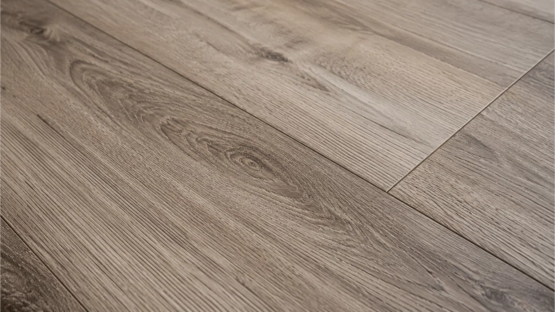 close up of luxury vinyl plank flooring showcasing realistic wood grain texture and durable surface finish