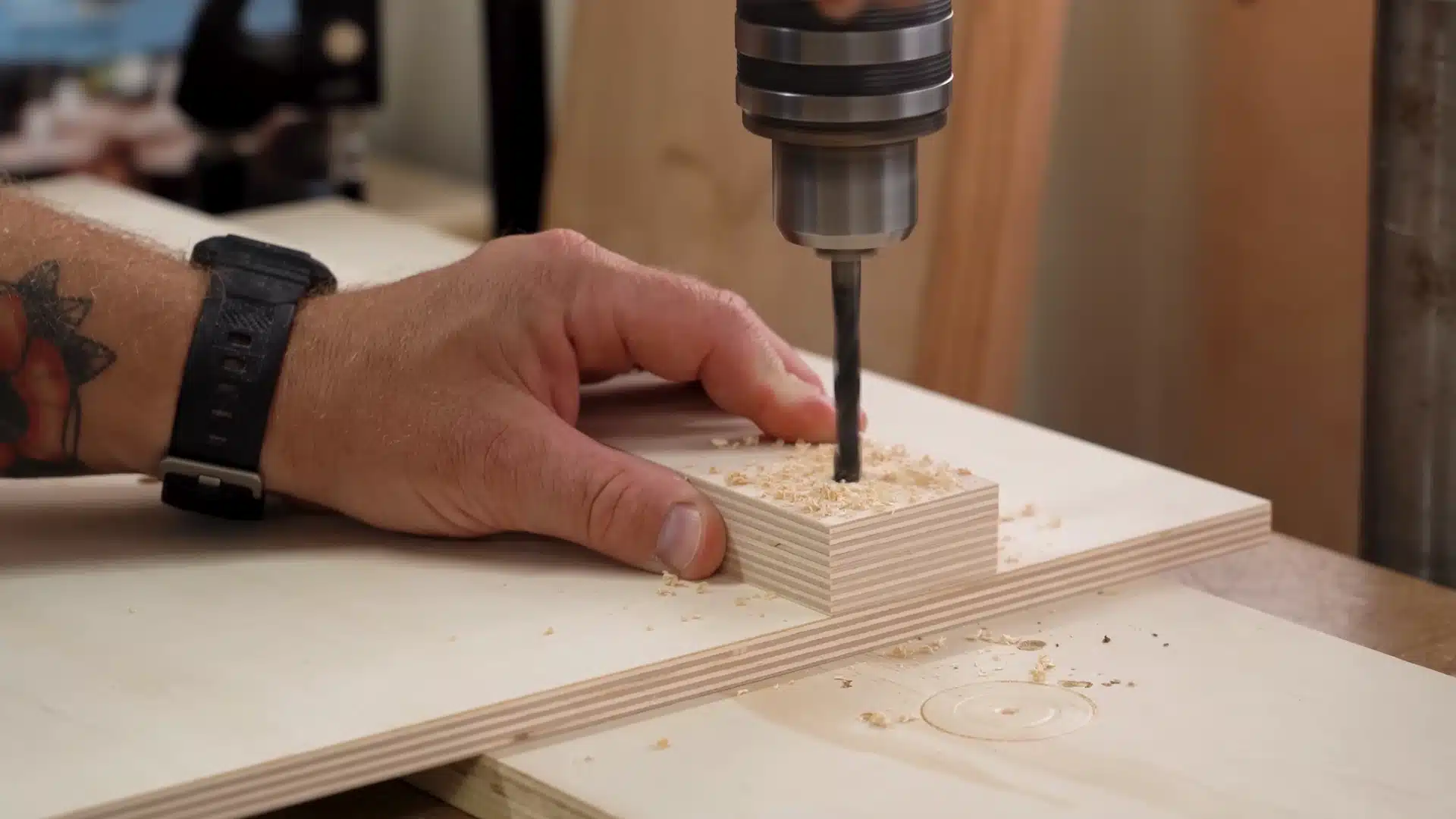 drilling adjustment knob hole in wood block