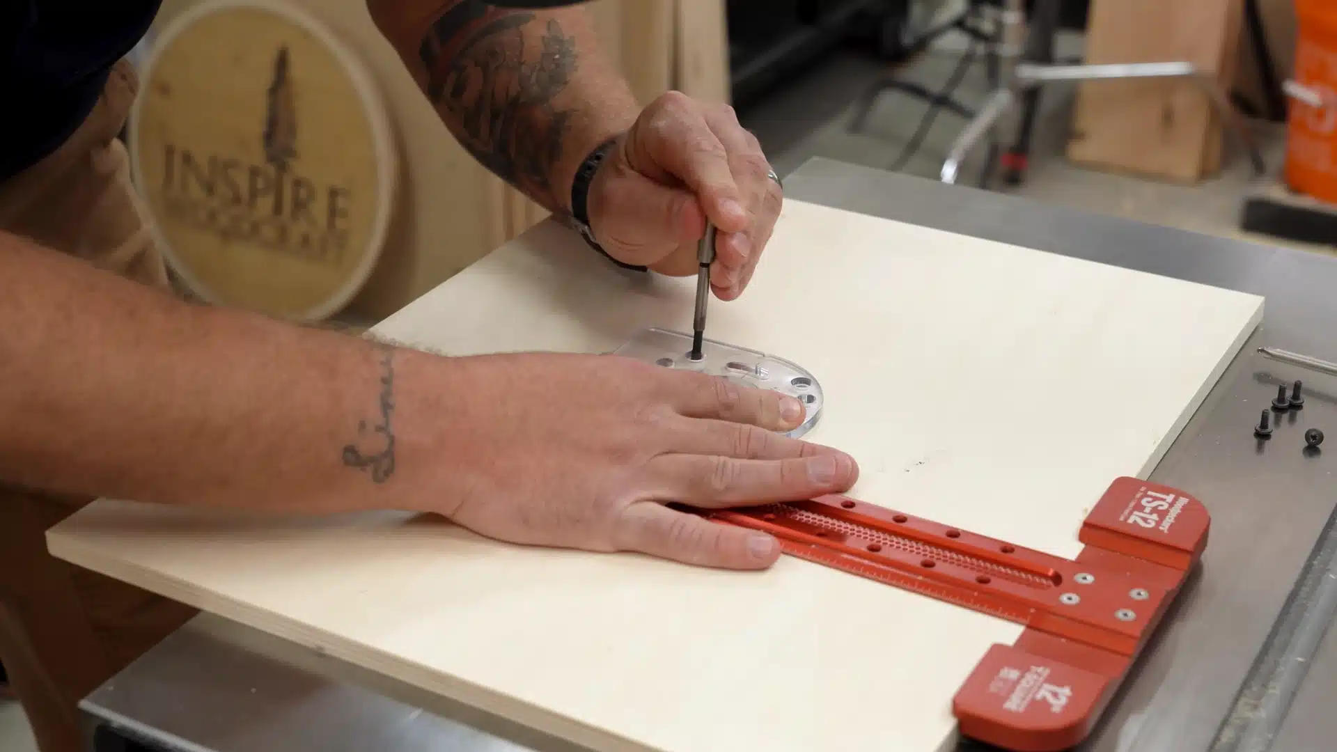 marking insert plate hole with screwdriver