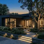 modern home and landscaped yard using layered outdoor lights across paths patio and trees