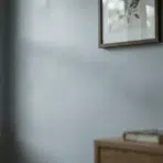 sherwin williams ice cube paint color on bedroom wall showing soft gray blue tone