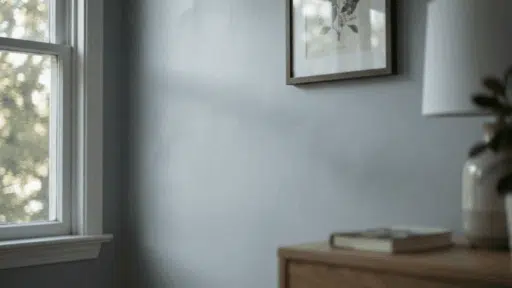 sherwin williams ice cube paint color on bedroom wall showing soft gray blue tone
