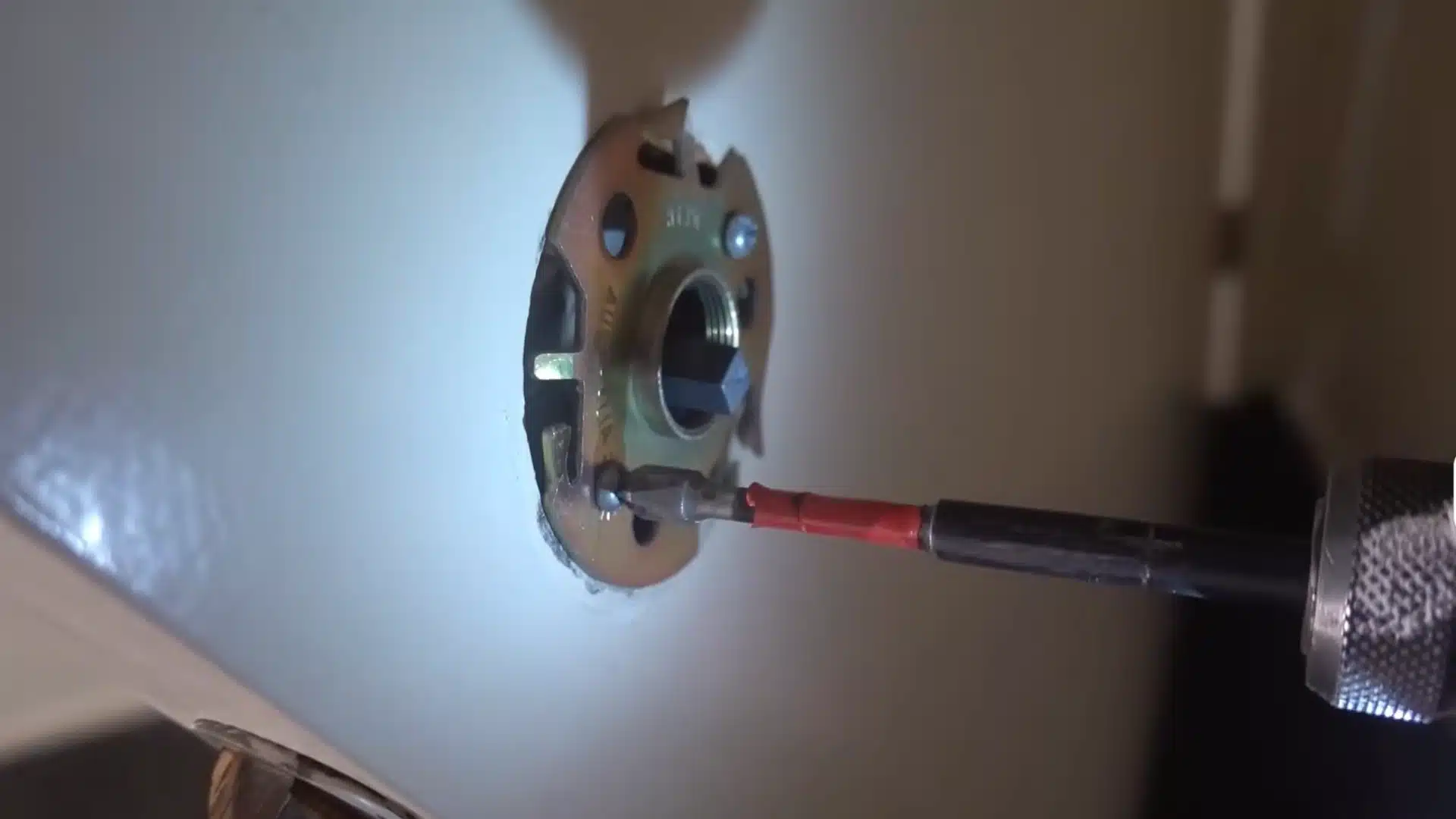 tighten the screws on both sides
