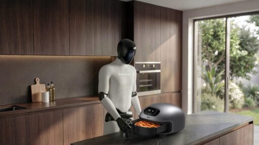 Robot operating a pizza oven in modern kitchen near large window with greenery outside
