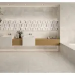 Modern bathroom with twin sinks on wooden vanity and geometric wall tiles in neutral tones